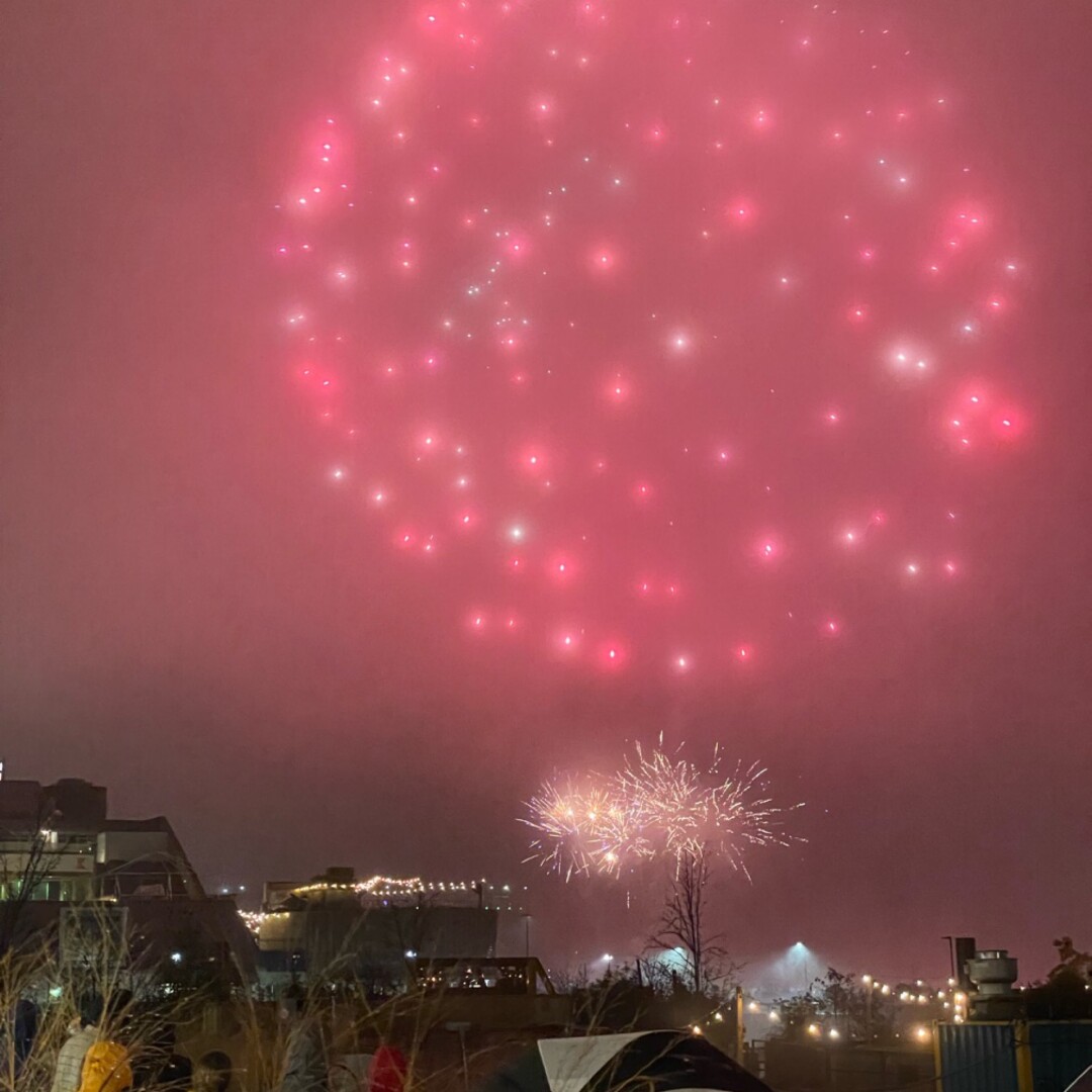 Red fireworks in the fog