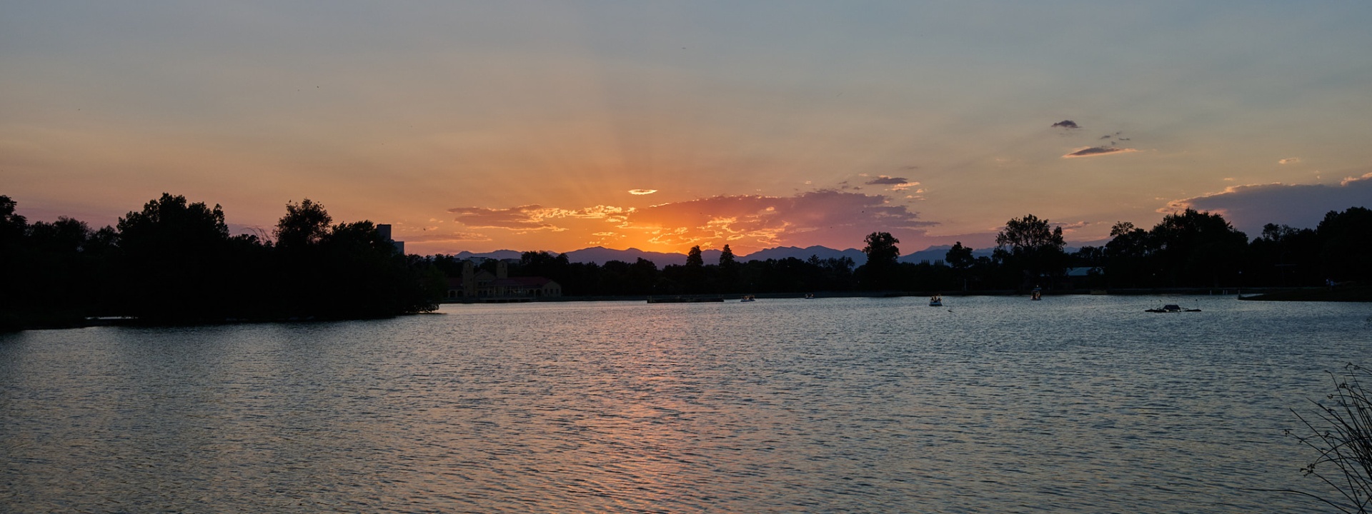 sunset over water, city park, denver, colorado